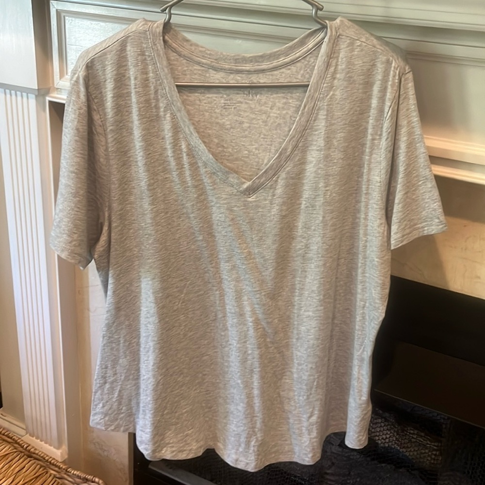 Gray tee. Size OX.  Never worn. Listing  # 180